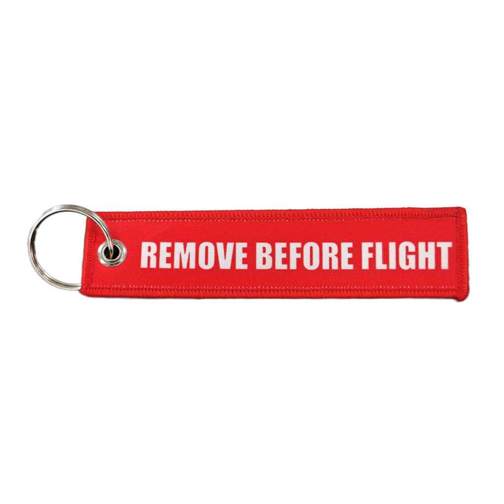 Remove before flight keychain