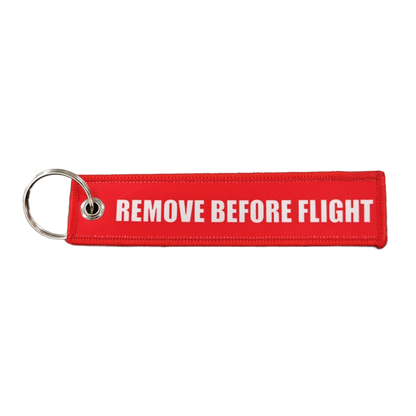 Remove before flight keychain